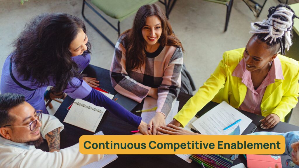 Sales people at table reaching in