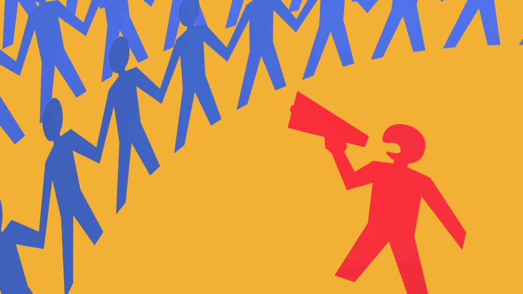 Paper figure with megaphone shouting